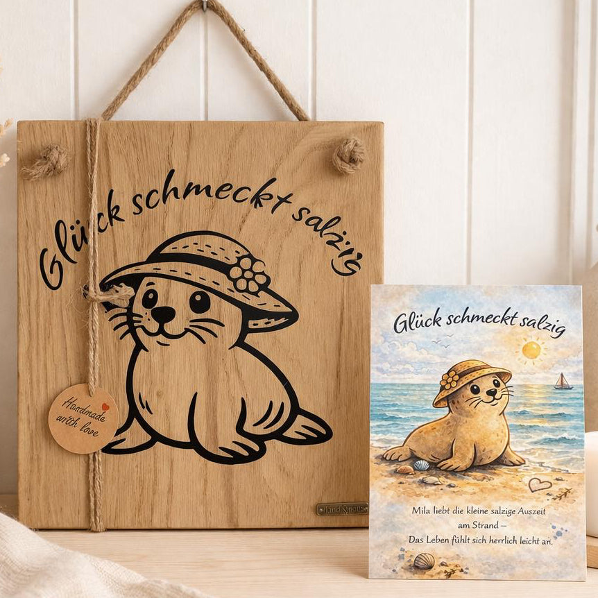 Maritime Wanddeko Holz Set mit Seehund Motiv und Schriftzug Glück schmeckt salzig Holzschild mit Karte im nordischen Stil